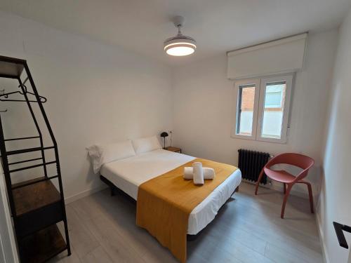 Ένα ή περισσότερα κρεβάτια σε δωμάτιο στο The Eight Unique Apartments
