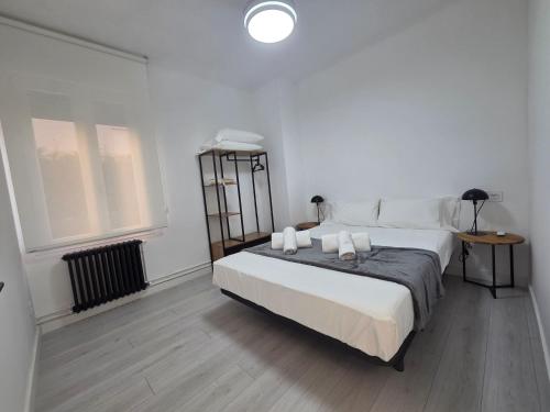 Ένα ή περισσότερα κρεβάτια σε δωμάτιο στο The Eight Unique Apartments