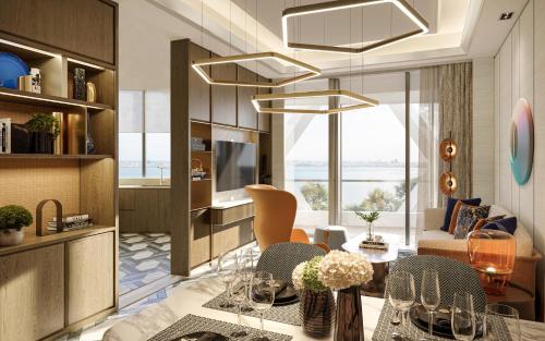 salon ze stołem i jadalnią w obiekcie Swissôtel Corniche Park Towers Doha w mieście Doha