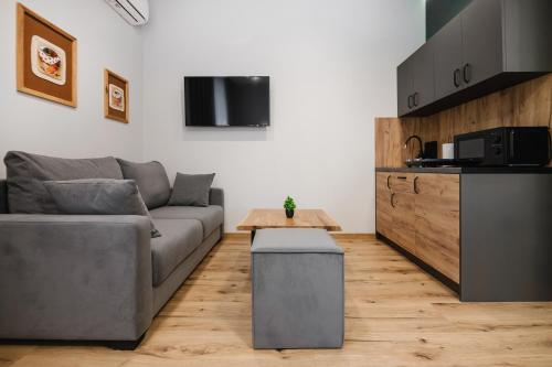 TV a/nebo společenská místnost v ubytování T7 Aparthotel