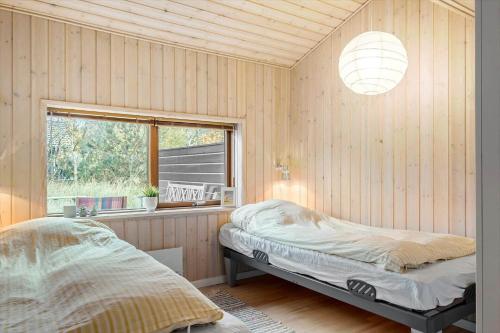 Ένα ή περισσότερα κρεβάτια σε δωμάτιο στο HA319-Hals-Osbornsvej-57