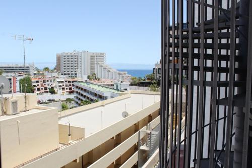 a view of the city from a building at Apartamentos Fayna in Playa del Ingles