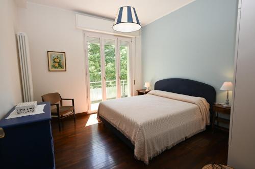 Ένα ή περισσότερα κρεβάτια σε δωμάτιο στο Casa Nobile, Fano centro e wifi