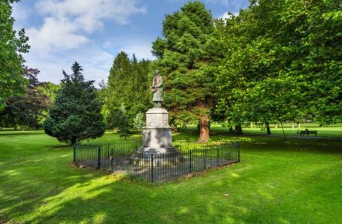 a statue in the middle of a park at North Strand Road Dublin City in Dublin