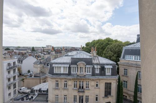 a view of a city from a building at ibis budget Le Mans Centre in Le Mans