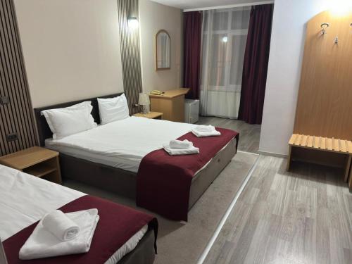 Katil atau katil-katil dalam bilik di Hotel Apollo Central