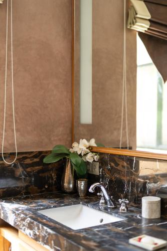 Η κουζίνα ή μικρή κουζίνα στο PL Place boutique hôtel & restaurant