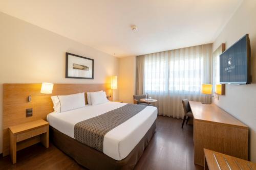 Кровать или кровати в номере Eurostars Lucentum