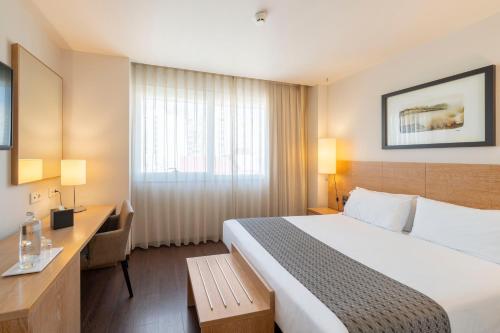 Кровать или кровати в номере Eurostars Lucentum