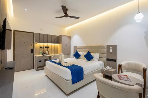 Letto o letti in una camera di La Maniere -Business hotel HITECH City