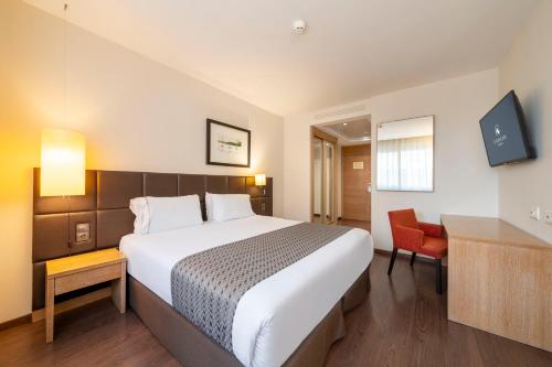 Кровать или кровати в номере Eurostars Lucentum