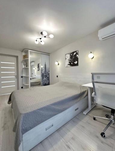 Giường trong phòng chung tại Boutique apartment Most City Area
