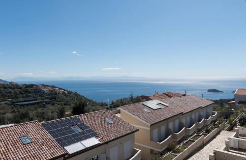 a group of buildings with solar panels on their roofs at Villa La Meraviglia - Between Sorrento & Amalfi Coast in Colli di Fontanelle