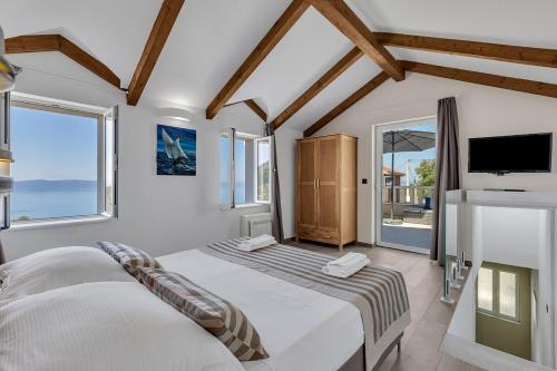 Katil atau katil-katil dalam bilik di Villa Toni - Makarska Exklusiv