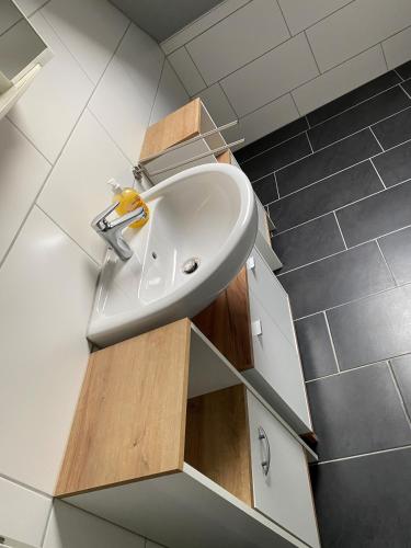 a bathroom with a sink in a room at Alida 2 in Helmstedt
