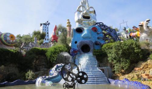 a statue of a person on a theme park at Smile in Manciano