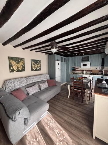 a living room with a couch and a table at Mira Cazorla in Cazorla