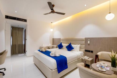 Letto o letti in una camera di La Maniere -Business hotel HITECH City