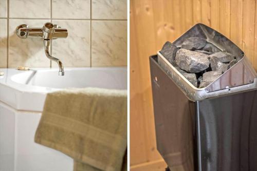 a bathroom with a sink and a trash can with rocks in it at OH253-Hadsund-Halvrebene-37 in Hadsund