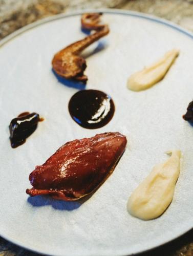 a white plate with some food on it at S'Hotelet d'es Born - Suites & SPA in Ciutadella