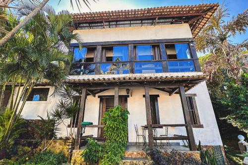 Taman di luar Loft Praia dos Anjos