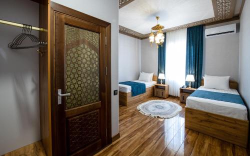 Katil atau katil-katil dalam bilik di Hotel FAROHAT ONA