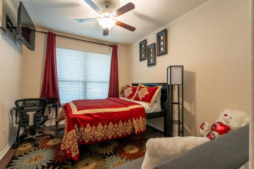 a bedroom with a bed and a ceiling fan at Blessed Home in Leander in Leander