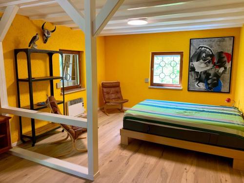 Postel nebo postele na pokoji v ubytování Holzhaus Devils Corner