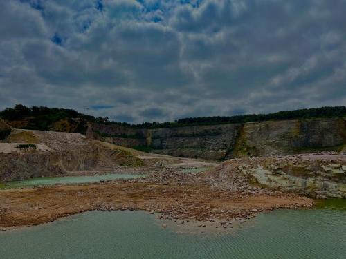 an aerial view of a quarry with a body of water at Maison Jazharra -SPA - 6 - 8 pers - Proche Golf in Frehel