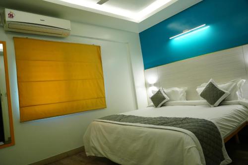 Imagine din galeria proprietății FabHotel SLR Residency în Bangalore