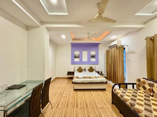 Postel nebo postele na pokoji v ubytování Le Tranquil Resort