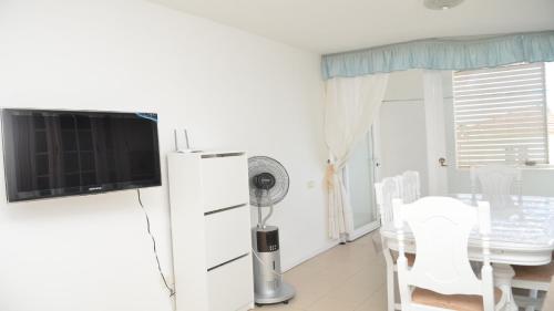 Televisyen dan/atau pusat hiburan di Casa Darias Duplex 1A