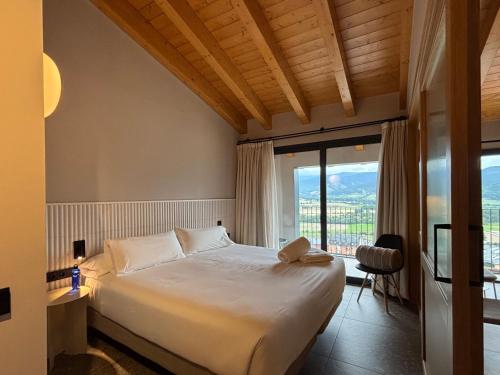 เตียงในห้องที่ CIM HOTEL BOUTIQUE