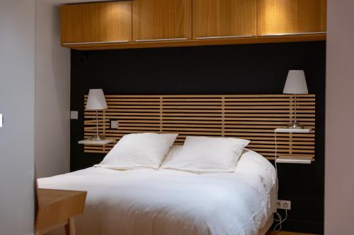 Llit o llits en una habitació de LOFT de CHARME