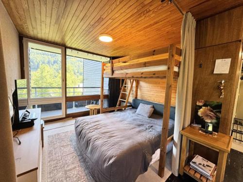 Postel nebo postele na pokoji v ubytování Résidence Olan - STUDIO 6 PERSONNES PIED DES PISTES MAE-9403