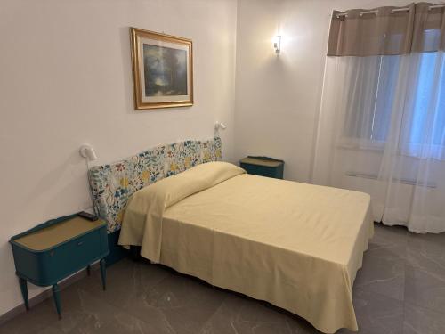 Postel nebo postele na pokoji v ubytování Alloggi In Corte