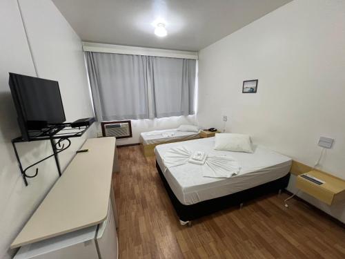 Postel nebo postele na pokoji v ubytování Hotel St. John