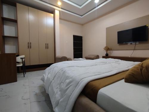 Cama o camas de una habitación en Ecotown homes