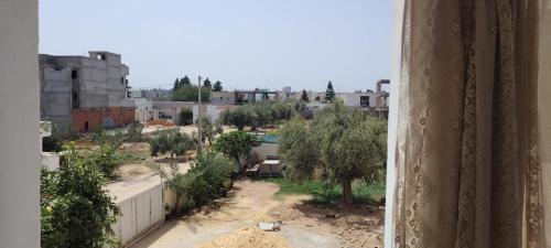 a view of a city from a window at تونس سوسة شط مريم in Akouda