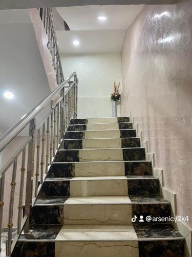 a set of stairs in a building at Allover suites & exclusive apartment in Abuja