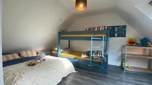 Una cama o camas en una habitación de Roz Avel