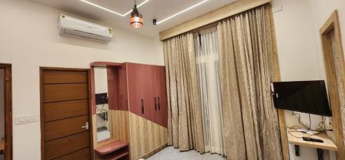 TV a/nebo společenská místnost v ubytování Itria private pool villa