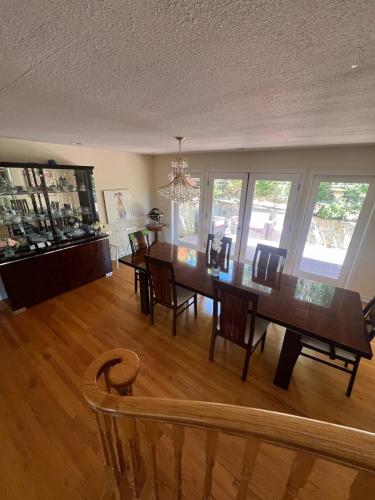 a dining room with a table and chairs at Big Bright Burlingame Hills Bay View Home in Burlingame