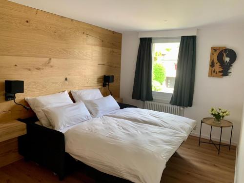 Cama o camas de una habitación en suite4you Erlen