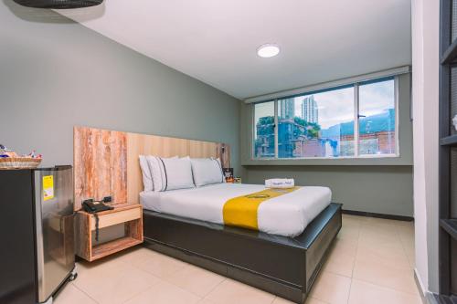 Mandala Hotel Centroにあるベッド