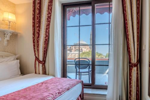Ένα ή περισσότερα κρεβάτια σε δωμάτιο στο The And Hotel Sultanahmet - Special Category