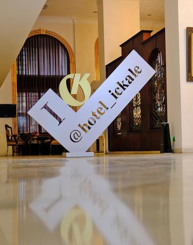a sign in the middle of a room with a lobby at Hotel Ickale in Ankara