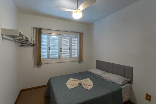 Ένα ή περισσότερα κρεβάτια σε δωμάτιο στο Casa grande e aconchegante