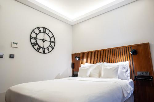 Letto o letti in una camera di Discovery Hotel