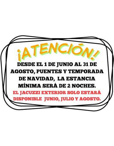 a label for a suitcase with the words attention at Loft Rural El Pajar del Molino in Benamahoma